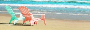 Bright Adirondak Chairs on the beach