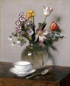 A Vase of Flowers With a Coffee Cup