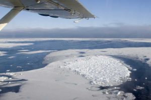 Canada, Manitoba, Aerial view of ice on the bay
