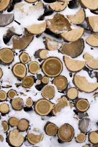 Canada, Churchill Stack of frozen cut fire wood