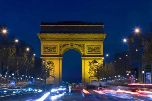 France, Paris The Arc de Triomphe at twilight