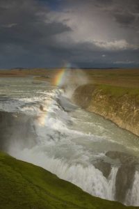 Iceland A rainbow arcs over Gullfoss falls