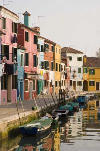 Italy, Burano Colorful houses of line a canal