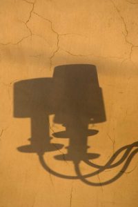 Italy, Venice Shadows of a lamp on a yellow wall