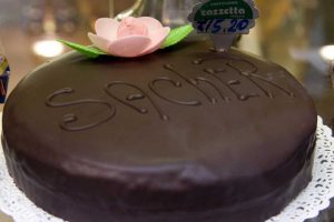 Italy, Venice Chocolate cake in a bakery window