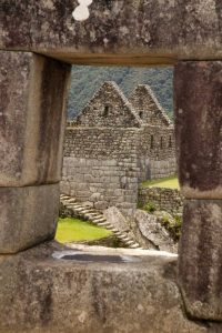 Peru, Machu PicchuHouse framed by a stone window